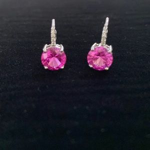 Dark pink stone earrings set in 925 silver.